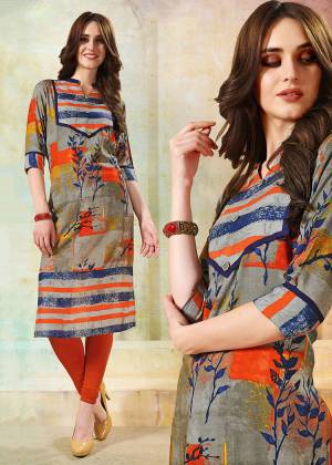 Go Colorful With This Multi Colored Readymade Kurti Fabricated On Rayon. This Kurti Is Beautified With Abstract Prints. 