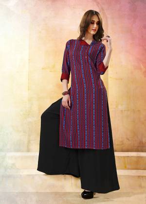 Go Colorful With This Multi Colored Readymade Kurti Fabricated On Rayon. This Kurti Is Beautified With Intricate Prints. 
