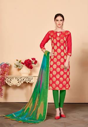 Proper Traditional Color Pallete Is Here With This Designer Dress Material In Red Colored Top Paired With Contrasting Green Colored Bottom And Dupatta. Its Top And Dupatta are Silk Based Paired With Cotton Fabricated Bottom.