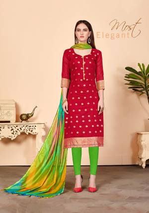 Proper Traditional Color Pallete Is Here With This Designer Dress Material In Red Colored Top Paired With Contrasting Green Colored Bottom And Dupatta. Its Top And Dupatta are Silk Based Paired With Cotton Fabricated Bottom.