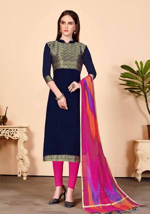 Look Beautiful In This Simple And Elegant Looking Dress Material In Navy Blue Colored Top Paired With Contrasting Dark Pink Colored Bottom And Dupatta. Its Top Is Jacquard Silk Fabricated Paired With Cotton Bottom And Banarasi Art Silk Dupatta. 