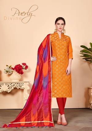 For Your Caasuals Or Semi-Casuals, Grab This Pretty Dress Material In Orange Colored Top Paired With Contrasting Red Colored Bottom And Dupatta. Its Top Is Fabricated On Jacquard Silk Paired With Cotton Fabricated Bottom And Banarasi Art Silk Dupatta. Buy Now.