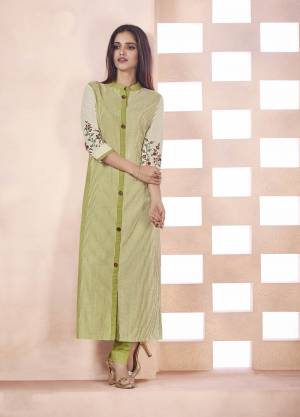 Rich and Elegant Looking Designer Readymade Straight Cut Kurti Is Here In Light Green And Cream Color Fabricated On Weaving Cotton. This Kurti Is Lining Prints With Thread Work. 