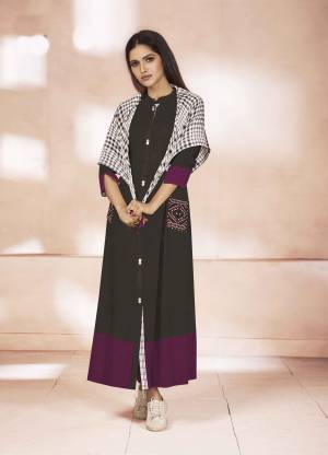 Grab This Readymade Kurti In Black And Wine Color Fabricated On Weaving Cotton. It Is Paired With Black And White Colored Checks Printed Scarf. It Is Available In All Sizes, choose As Per Your Comfort,.