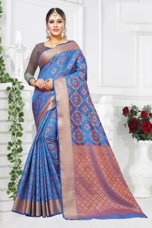 Pure Traditional Shade Is Here With This Designer Saree In Blue Color Paired With Blue Colored Blouse. This Saree And Blouse Are Fabricated On Patola Art Silk Beautified with Weave All Over It. 