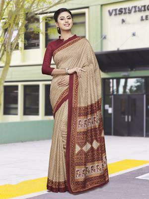 No More Worry For What To Wear At Your Place, Grab This Satin Silk Fabricated Saree And Blouse Beautified With Prints All Over. This Saree Can Be Used As Uniform At Different Places Like Airports, Hospitals And Hotels