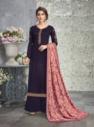 Bright And Visually Appealing Pallete Is Here With This Designer Suit In Purple Color Paired With Contrasting Pink Colored Dupatta. Its Top Is Fabricated On Silk Georgette Paired With Santoon Bottom And Soft Silk Fabricated Dupatta. Its Main Attraction Is Its Heavy Embroidered Dupatta. Buy Now.