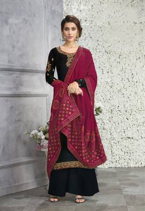 For A Bold And Beautiful Look, Grab This Designer Suit In Black Color Paired With Magenta Pink Colored Dupatta. Its Top Is Fabricated On Silk Georgette Paired With Santoon Bottom And Soft Silk Fabricated Dupatta. It Has Heavy Embroidery Over The Top And Dupatta Making The Suit More Attractive. 