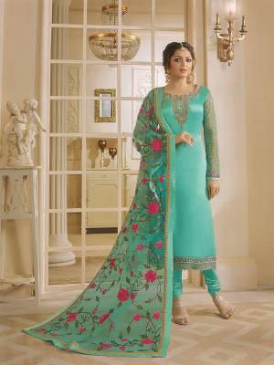 Here Is A Very Pretty Designer Straight Suit In Sky Blue Color Paired With Sky Blue Colored Bottom And Dupatta. Its Top Is Fabricated On Satin Georgette Paired With Santoon Bottom And Heavy Embroidered Net Fabricated Dupatta. 