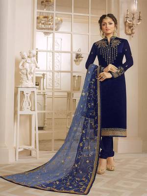 Enhance Your Personality Wearing This Heavy designer Straight Cut Suit In Navy Blue Color Paired With Navy Blue Colored Bottom And Dupatta. Its Top Is Satin Georgette Paired With Santoon Bottom Net Fabricated Heavy Embroidered Dupatta. Buy This Designer Suit Now.
