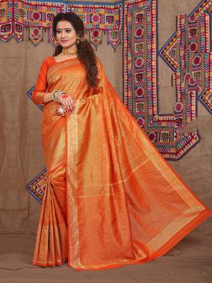 Celebrate This Festive Season With Beauty And Comfort Wearing This Designer Silk Based Saree In Orange Color. This Saree Is Fabricated On Jacquard Silk Beautified With Attractive Weave Paired With Art Silk Fabricated Blouse. 