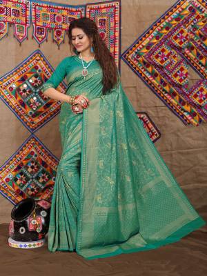 Celebrate This Festive Season With Beauty And Comfort Wearing This Designer Silk Based Saree In Sea Green Color. This Saree Is Fabricated On Jacquard Silk Beautified With Attractive Weave Paired With Art Silk Fabricated Blouse. 