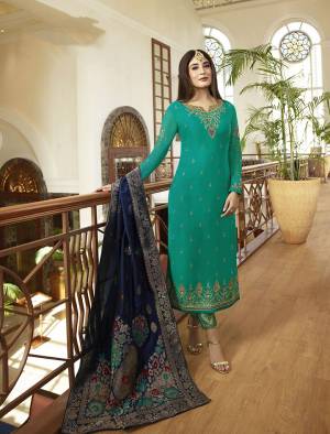 Look Beautiful In This Fresh Color Pallet Weairng This Designer Straight Suit In Sea Green Color Paired With Contrasting Navy Blue Colored Dupatta. Its Top Is Fabricated On Satin Georgette Paired With Santoon Bottom And Jacquard Silk Fabricated Dupatta.Buy Now.