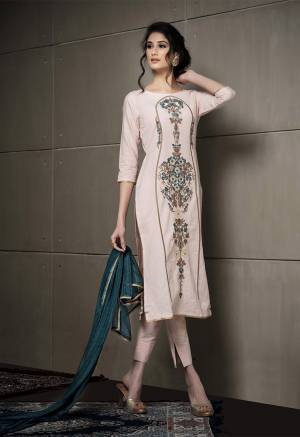 Simple And Elegant Looking Designer Straight Suit Is Here In Cream Color Paired With Contrasting Light Blue Colored Dupatta. Its Embroidered Top Is Fabricated On Cotton Linen Paired With Cotton Bottom And Chiffon Fabricated Dupatta. 