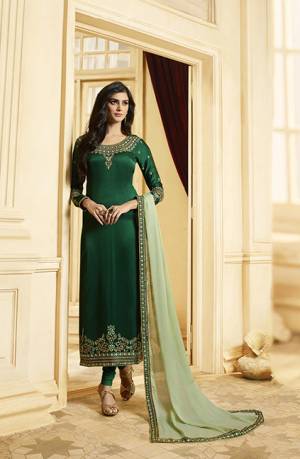 Go With The Pretty Shades Of Green With This Designer Straight Cut Suit In Dark Green Color Paired With Contrasting Pastel Green Colored Dupatta. Its Top Is Fabricated On Satin Georgette Paired With Santoon Bottom And Georgette Fabricated Dupatta. 