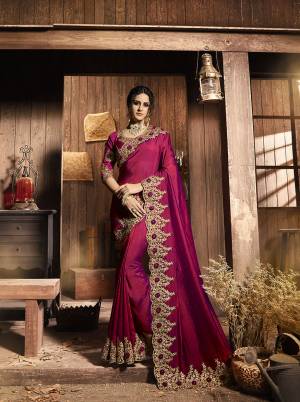 Bright And Visually Appealing Color Is Here With This Heavy Designer In Dark Pink Color. This Saree Is Fabricated Two Tone Soft Silk Paired With Art Silk Fabricated Blouse. It Is Beautified With Heavy Embroidered Patch Border Giving It An Attractive Look. 