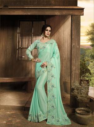 Celebrate This Festive Season With Beauty And Comfort Wearing This Heavy Deisgner Saree In Sea Green Color Paired With Sea Green Colored Blouse. This Pretty Saree Is Fabricated On Satin Silk Paired With Art Silk Fabricated Blouse. This Saree Is Beautified With Attractive Embroidery And Also Its Fabric Is Soft And Durable.