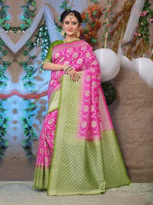 This Festive Season Look The Most Elegant Of All Wearing This Designer Silk based Saree Beautified With Weave. This Saree Is Light Weight, Durable And Easy To Carry Throughout The Gala