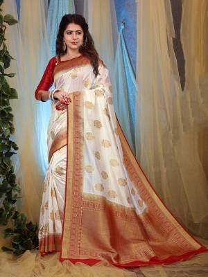 This Festive Season Look The Most Elegant Of All Wearing This Designer Jacquard Silk based Saree Beautified With Weave. This Saree Is Light Weight, Durable And Easy To Carry Throuhout The Gala