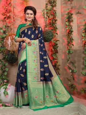 This Festive Season Look The Most Elegant Of All Wearing This Designer Jacquard Silk based Saree Beautified With Weave. This Saree Is Light Weight, Durable And Easy To Carry Throuhout The Gala
