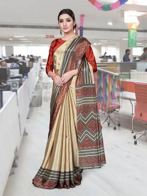 Comfort Is The First Priority When You Go To Your Work Place. So Keeping Your Comfort In Mind This Printed Saree Is Designed As A Uniform For Your Work Place. This Saree And Blouse are Fabricated On Art Silk Beautified With Prints Which Is Also Light In Weight And Easy To Carry All Day Long