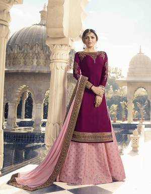 Go With The Shades Of Pretty Pink With This Designer Indo-Western Suit On Magenta Pink Colored Top Paired With Pink Colored Bottom And Dupatta. Its Embroidered Top Is Satin Georgette Based Paired With Brocade Bottom And Chiffon Fabricated Dupatta. 