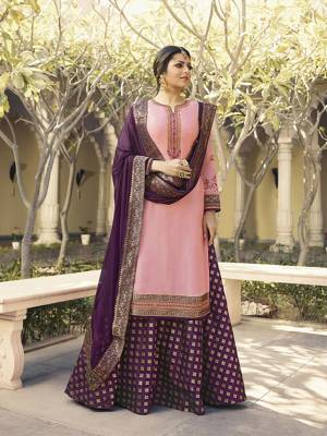 Look Pretty In This Designer Indo-Western Suit In Pink Colored Top Paired With Contrasting Purple Colored Bottom And Dupatta. Its Top Is Fabricated On Satin Georgette Paired With Brocade Bottom And Chiffon Fabricated Dupatta. Its Top Is Beautified With Attractive Embroidery And Lace Border Over The Dupatta.