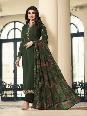 Look Beautiful Wearing This Designer Straight Suit In All Over Dark Green Color. Its Top And Bottom Are Fabricated On Crepe Paired With Chiffon Fabricated Dupatta. Get This Dress Material Stitched As Per Your Desired Fit And Comfort. 