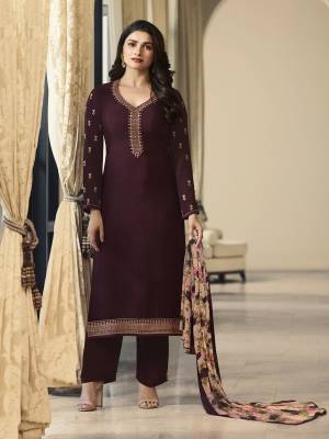 Enhance Your Personality Wearing This Designer Straight Cut Suit In Dark Brown Color Paired With Contrasting Beige And Brown Colored Dupatta. This Dress Material Is Crepe Based Paired With Chiffon Fabricated Dupatta. 