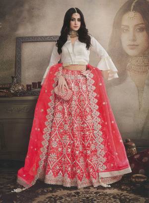Get Ready For The Upcoming Festive And Wedding Season With This Designer Lehenga Choli In Off-White Colored Blouse Paired With Red Colored Bottom And Dupatta. This Lehenga Choli IS Orgenza Based Beautified With Attractive Resham Work. 