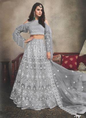 Flaunt Your Rich And Elegant Taste In This Heavy Designer Lehenga Choli In All Over Grey Color. This Pretty Lehenga Choli Is Fabricated On Orgenza Beautified With Tone To Tone Resham Embroidery Which Gives A Subtle And Elegant Look To This Designer Lehenga Choli. 