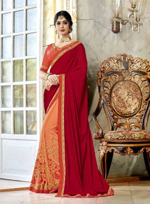 Grab This Beautiful Designer Saree For The Upcoming Festive And Wedding Season In Traditional Orange And Maroon Color Paired With Maroon Colored Blouse. This Saree Is Fabricated On Vichitra Silk And Georgette Paired With Art Silk Fabricated Blouse. It Has Embroidered Blouse With Pretty Embrodered Saree Panel. Buy Now.