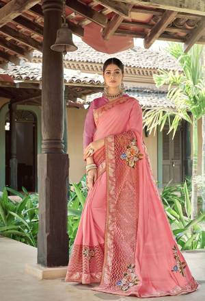 Look Pretty In This Designer Light Pink Colored Saree. This Saree Is Georgette Based Paired With Art Silk Fabricated Blouse. Its Pretty Color And Fabric Will Earn You Lots Of Compliments From Onlookers And Ensures Superb Comfort All Day Long. 
