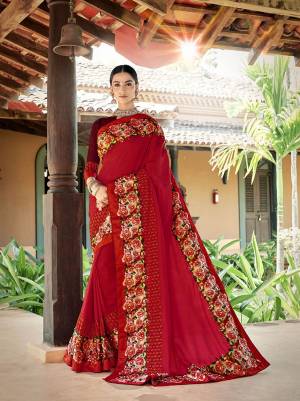 Adorn The Pretty Angelic Look Wearing This Designer Saree In Red Color Paired With Maroon Colored Blouse .This Saree And Blouse Are Fabricated On Art Silk Beautified Floral Patches And Embroidery. Buy Now.