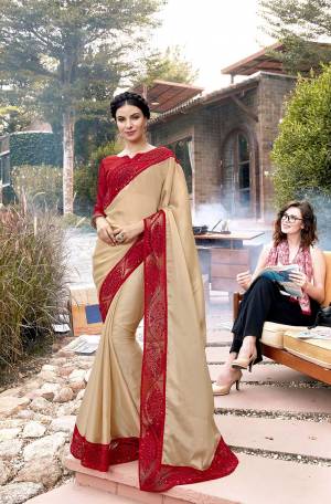 Simple And Elegant Looking Designer Saree Is Here In Beige Color Paired With Red Colored Blouse. This Saree Is Fabricated On Georgette Paired With Art Silk Fabricated Blouse. Its Saree Border Is Beautified With Tone To Tone Embroidery. 