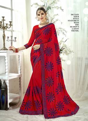 Grab This Attractive Looking Designer Saree In Red Color Paired With Red Colored Blouse. This Saree And Blouse are Georgette Based Beautified with Contrasting Resham Embridery And Stone Work. 