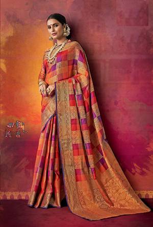 Go Colorful With This Designer Silk Based Saree In Orange And Purple Color Paired With Orange Colored Blouse. This Saree And Blouse Are Fabricated On Art Silk beautified With Attractive Weave In Checks Pattern. Buy Now.