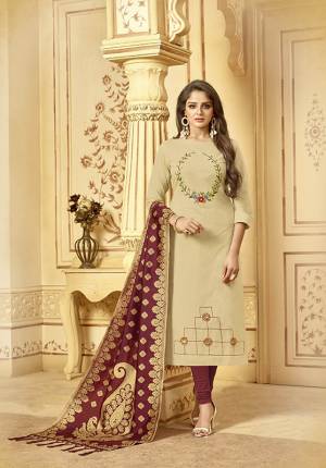 Flaunt Your Rich And Elegant Taste Wearing This Designer Straight Cut Suit In Beige Color Paired With Maroon Colored Bottom And Dupatta. Its Pretty Resham Embroidered Top Is Fabricated On Cotton Slub Paired With Cotton Bottom And Banarasi Jacquard Dupatta. Buy This Now.