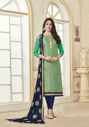 Add This Pretty Dress Material In  Green And Navy Blue Color Which You Can Stitched As Per Your Desired Fit And Comfort. Its Top Is Fabricated On Soft Banarasi Jacquard Paired With Cotton Bottom And Chiffon Fabricated Dupatta. Buy Now.
