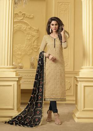 Grab This Designer Suit In Beige Colored Top Paired With Black Colored Bottom and Dupatta. Its Top Is Fabricated On Soft Banarasi Jacquard Paired With Cotton Bottom And Chiffon Fabricated Dupatta. Get This Dress Material Stitched As Per Your Desired Fit And Comfort. 