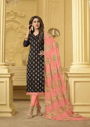 Add This Pretty Dress Material In Black And Dark Peach Color Which You Can Stitched As Per Your Desired Fit And Comfort. Its Top Is Fabricated On Soft Banarasi Jacquard Paired With Cotton Bottom And Chiffon Fabricated Dupatta. Buy Now.