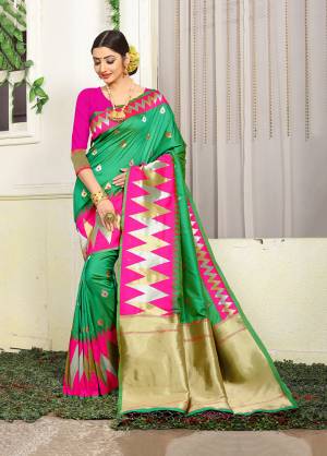 Celebrate This Festive Season With Beauty And Comfort Wearing This Designer Silk Based Saree In Green Color Paired With Contrasting Rani Pink Colored Blouse. This Saree Is Fabricated On Jacquard Silk Paired With Art Silk Fabricated Blouse. Buy Now.