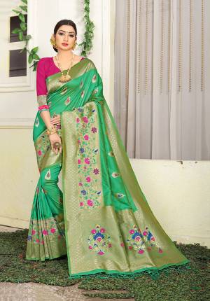 Celebrate This Festive Season With Beauty And Comfort Wearing This Designer Silk Based Saree In Green Color Paired With Contrasting Dark Pink Colored Blouse. This Saree Is Fabricated On Jacquard Silk Paired With Art Silk Fabricated Blouse. Buy Now.
