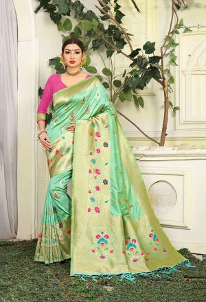 Summer Season Is About Subtle Shades And Pastel Play, Grab This Designer Silk Based Saree In Pastel Green Color Paired With Contrasting Rani Pink Colored Blouse. This Saree Is Fabricated In Jacquard Silk Paired With Art Silk Fabricated Blouse. Buy Now. 