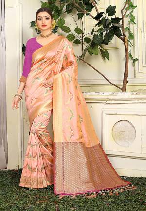 Here Is A Very Pretty Shade With This Designer Silk Based Saree In Peach Color Paired With Contrasting Magenta Pink Colored Blouse. This Saree Is Fabricated On Jacquard Silk Paired With Art Silk Fabricated Blouse. Buy Now.