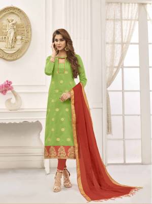 Celebrate This Festive Season With Beauty And Comfort Wearing This Cotton Based Dress Material In Green Color Paired With Contrasting Rust Orange Colored Bottom And Dupatta. Its Dupatta Is Fabricated On Art Silk. Buy This Suit Now.