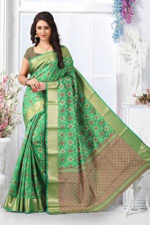 This Festive Season Look The Most Elegant Of All Wearing This Designer Silk based Saree Beautified With Weave. This Saree Is Light Weight, Durable And Easy To Carry Throughout The Gala