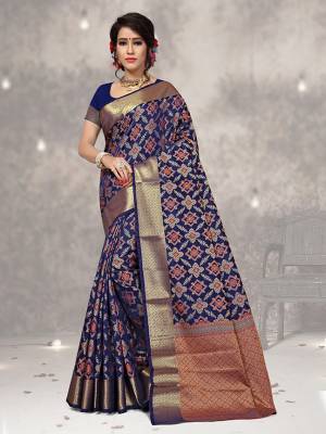 Look Pretty In This Designer Silk Based Saree Beautified With Weave All Over. Its Rich Fabric And Unique Weave Pattern Will Earn You Lots Of Compliments From Onlookers