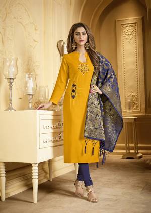 Celebrate This Festive Season With Beauty And Comfort Wearing This Designer Suit In Musturd Yellow Colored Top Paired With Contrasting Navy Blue Colored Bottom And Dupatta. Its Top Is Beautified With Resham Embroidery And Weaved Banarasi Dupatta. Get This Dress Material Stitched As Per Your Desired Fit And Comfort. 