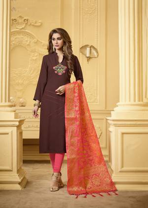 If Those Readymade Suit Does Not Lend You The Desired Comfort Than Grab This Designer Dress Material In Brown And Fuschia Pink Color And Get This Stitched As Per Your Desired Fit And Comfort .